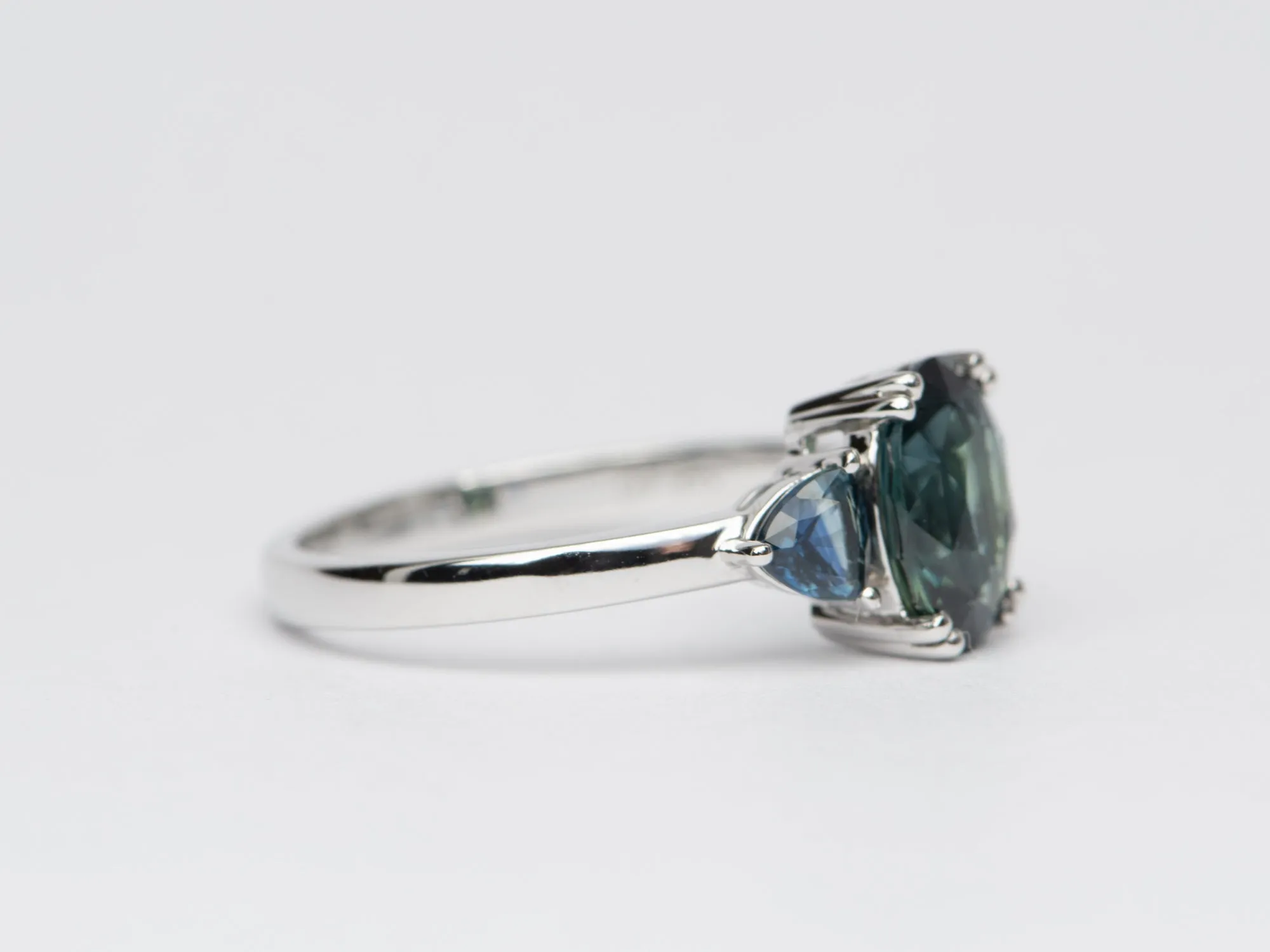 2.85 carat teal sapphire 3-stone white gold engagement ring