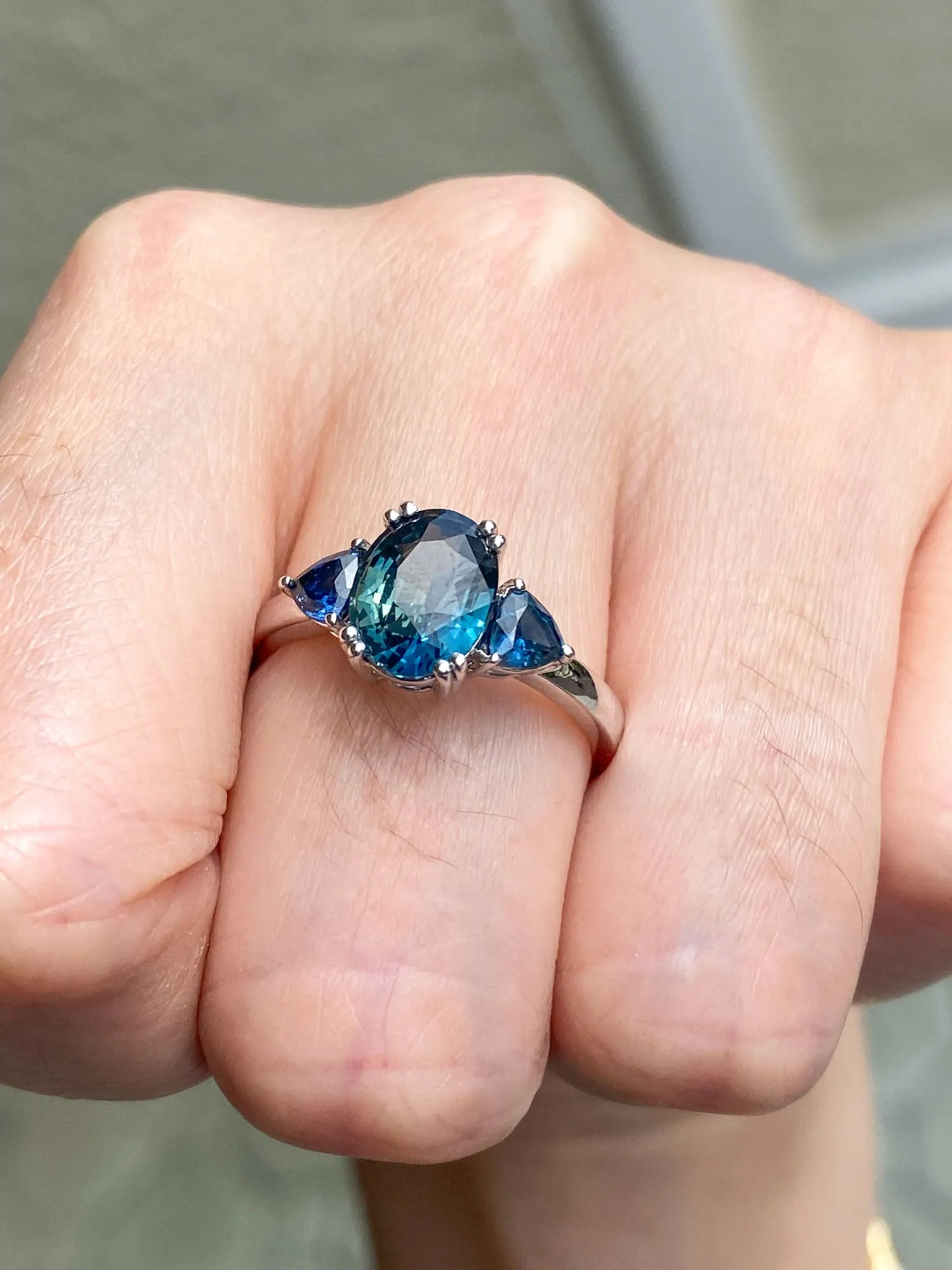 2.85 carat teal sapphire 3-stone white gold engagement ring