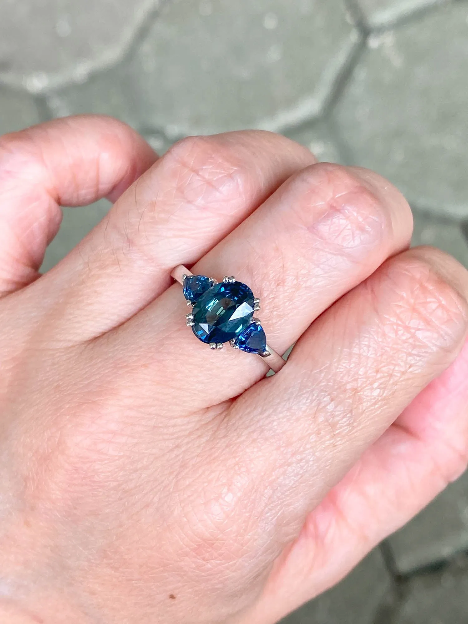 2.85 carat teal sapphire 3-stone white gold engagement ring