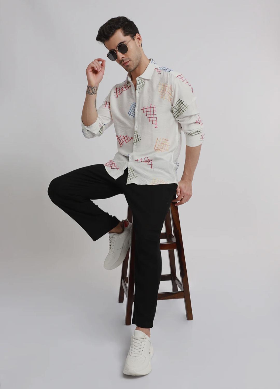 white embroidered shirt with geometric pattern