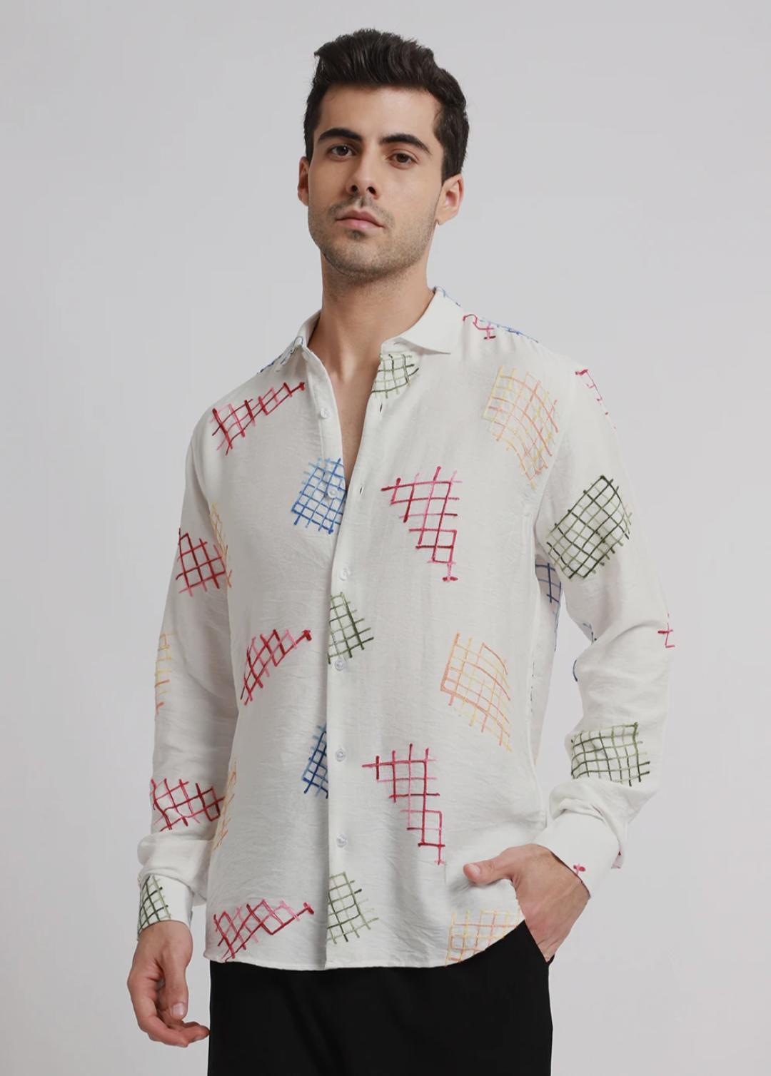 white embroidered shirt with geometric pattern