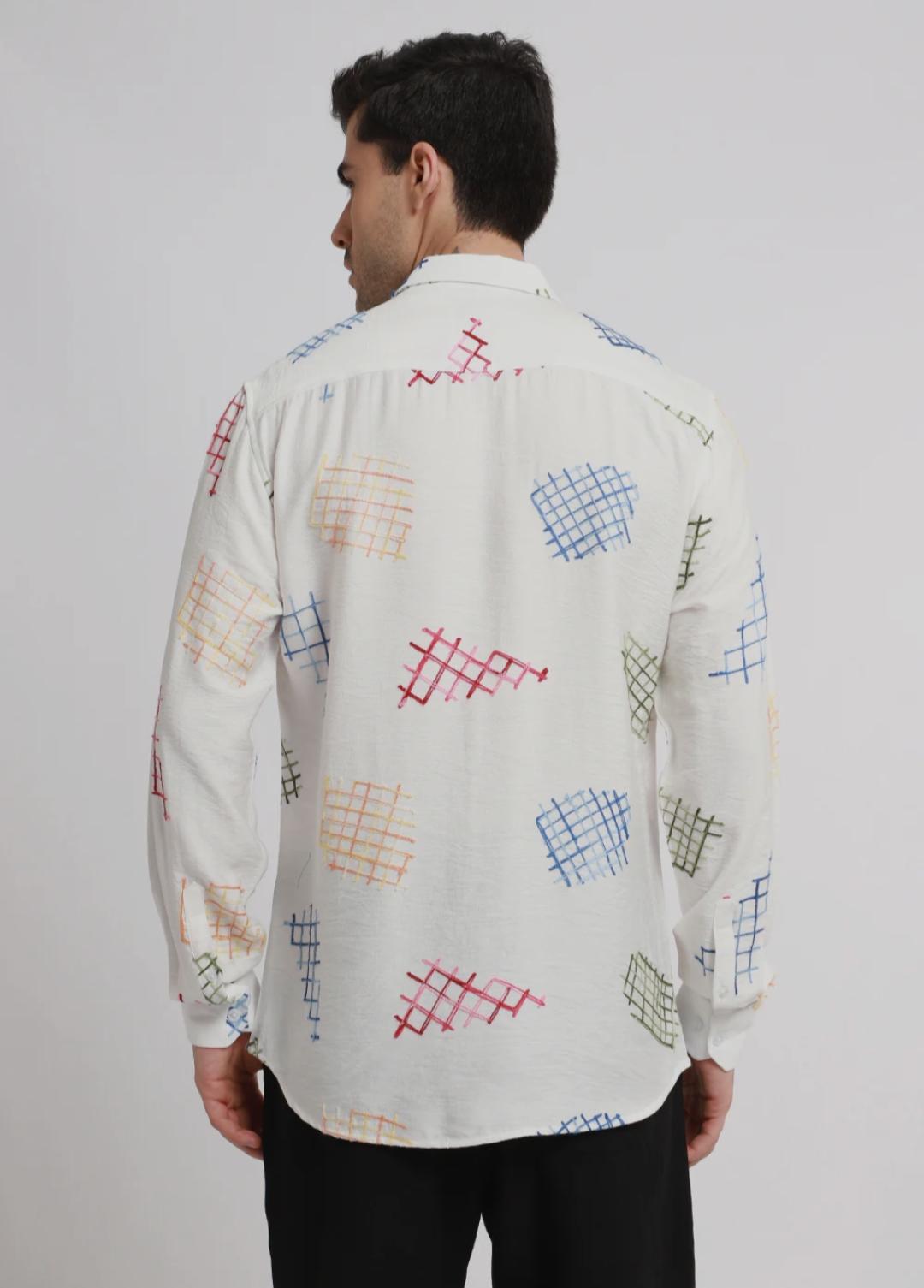 white embroidered shirt with geometric pattern